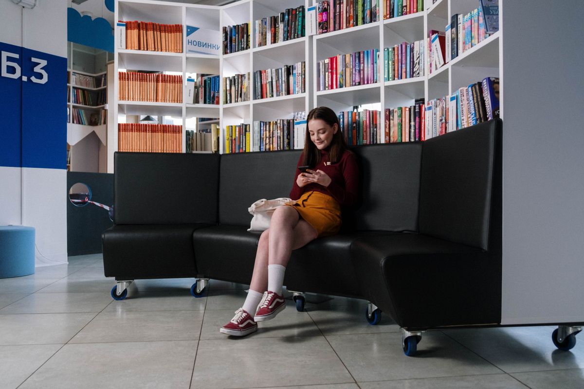 A teenager using Instagram on her smartphone, the audience medical practices can no longer target with interest based ads in 2026