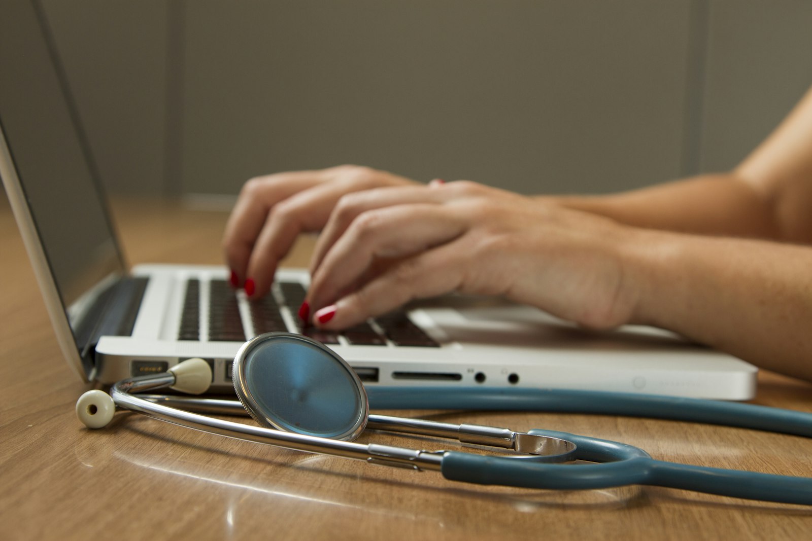 A patient searching online to check if a doctor takes their insurance before booking an appointment