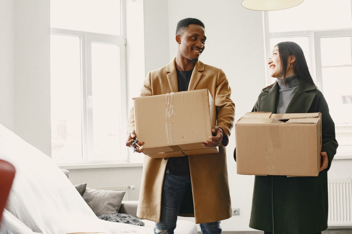 Moving boxes stacked in a new medical practice office, representing a healthcare relocation and its effect on Google ranking