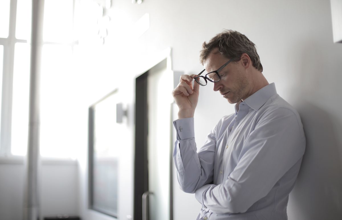 Medical practice owner pausing to think about whether the practice website needs a cookie banner and privacy consent