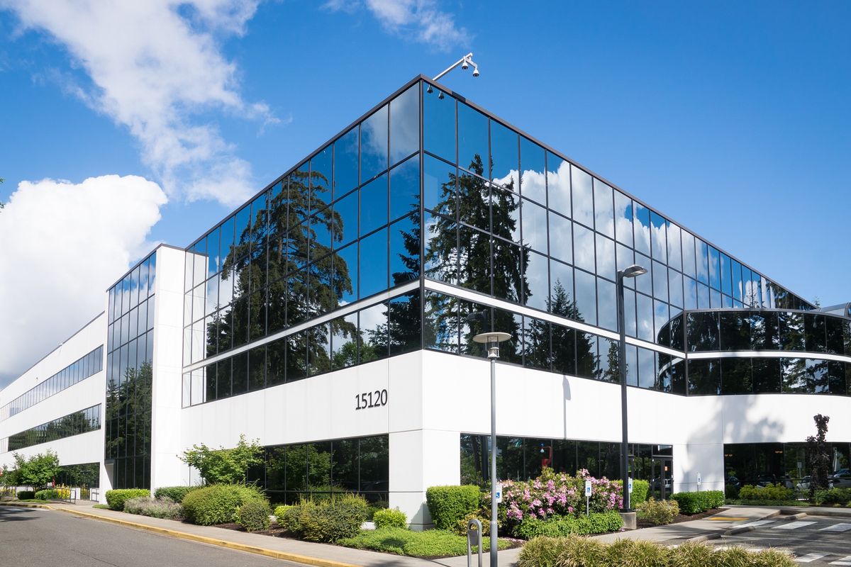 A modern medical office building with its street address visible, the kind of location detail patients find on a Google Business Profile