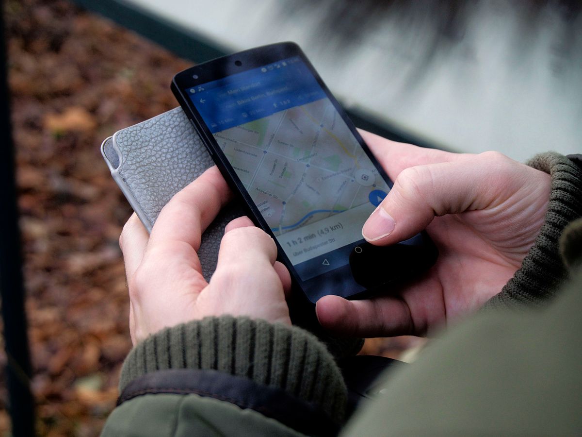 A person searching for a local business on a phone using Google Maps, the moment a patient decides whether to call your medical practice or scroll to the next one