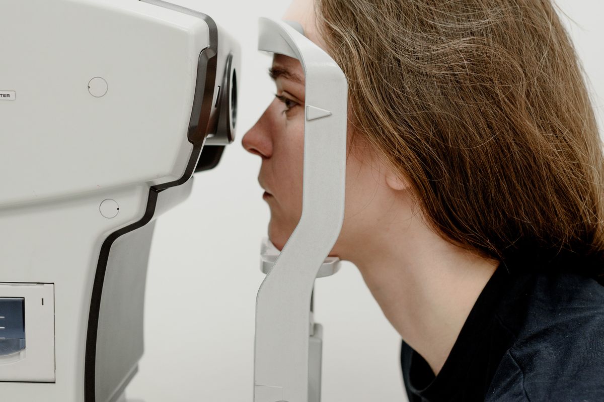 Patient getting an eye exam at an independent optometry practice, the part of eye care online sellers cannot replace