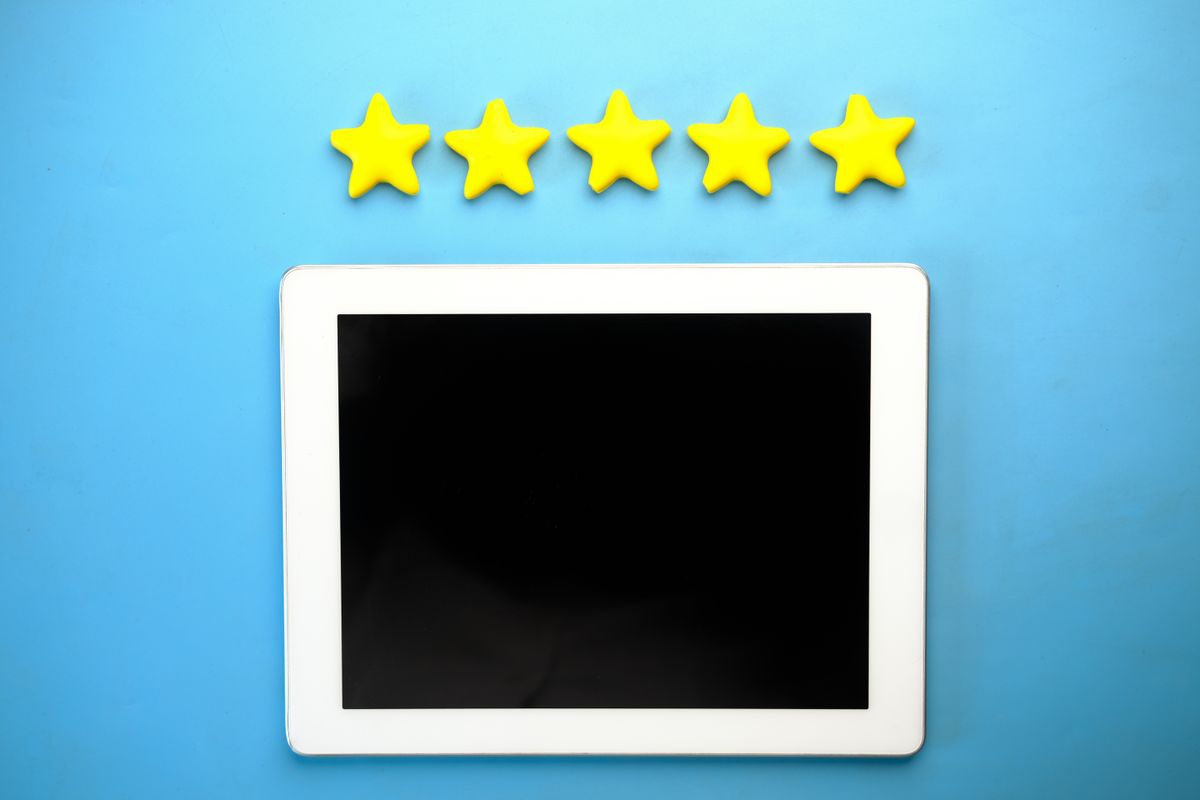 Five star rating on a screen, representing recent fresh Google reviews for a medical practice