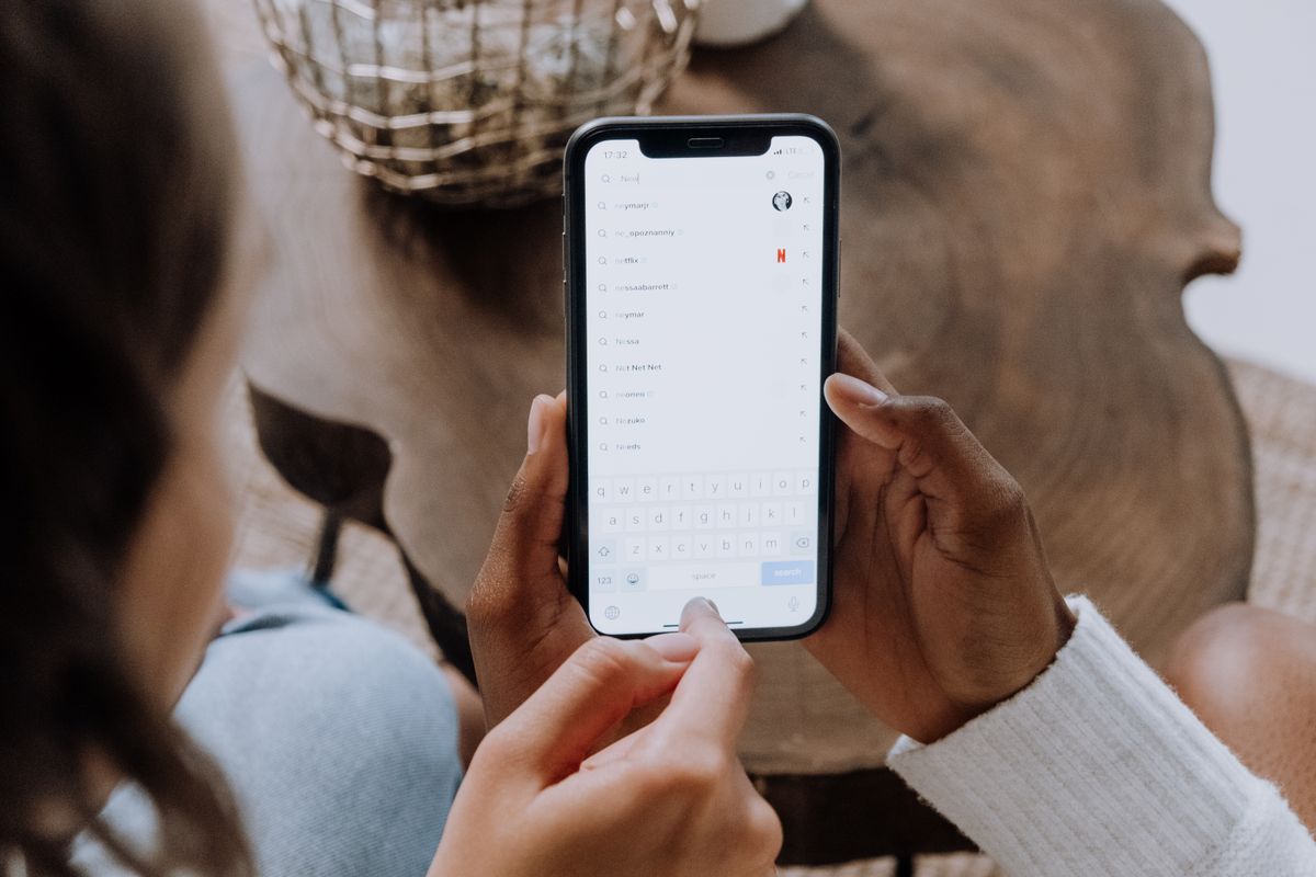 Person searching on a phone the way a patient looks for a doctor on Google