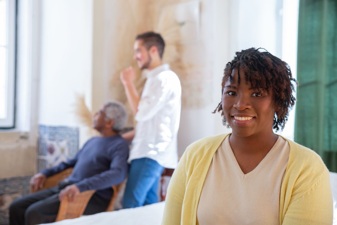 A family medicine doctor talking with a patient during a primary care visit