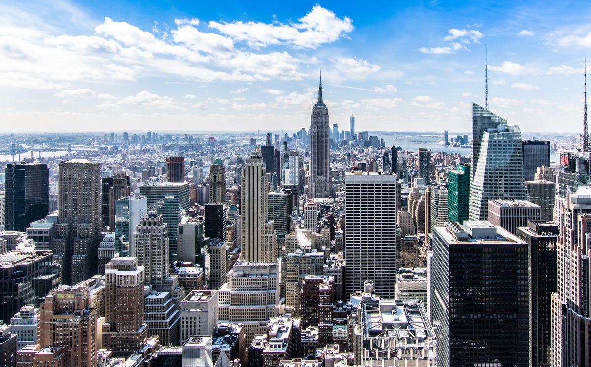 Dense big city skyline representing a competitive urban market where a medical practice fights to stand out in local search