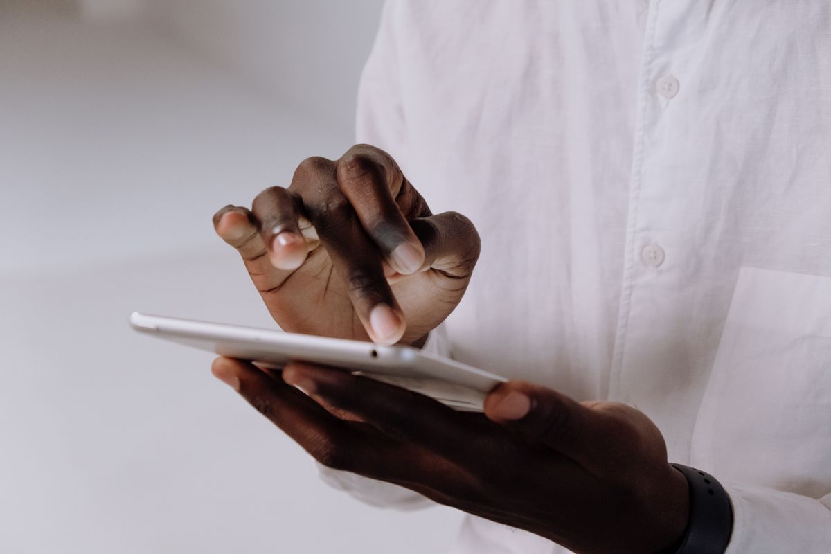 A patient searching on a device for a nearby medical practice location