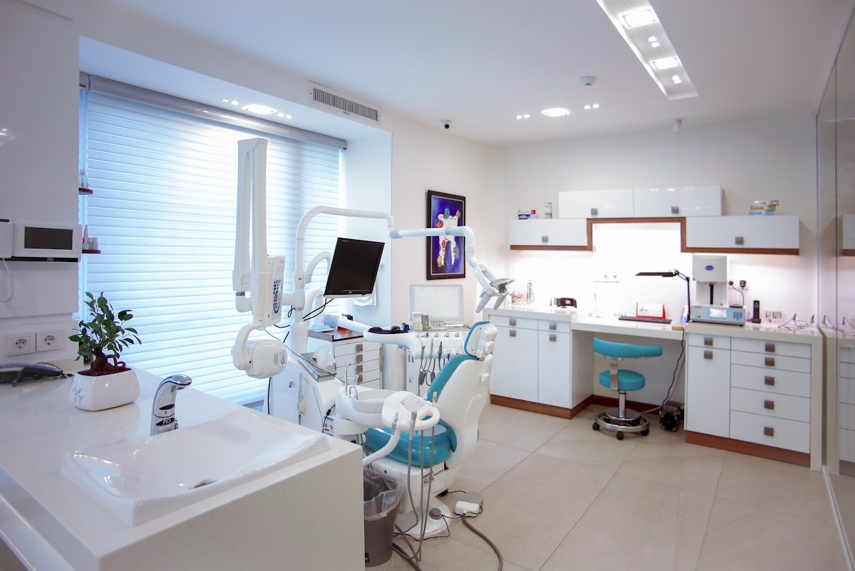 A brand new medical practice treatment room, clean and fully equipped, ready for its first patients