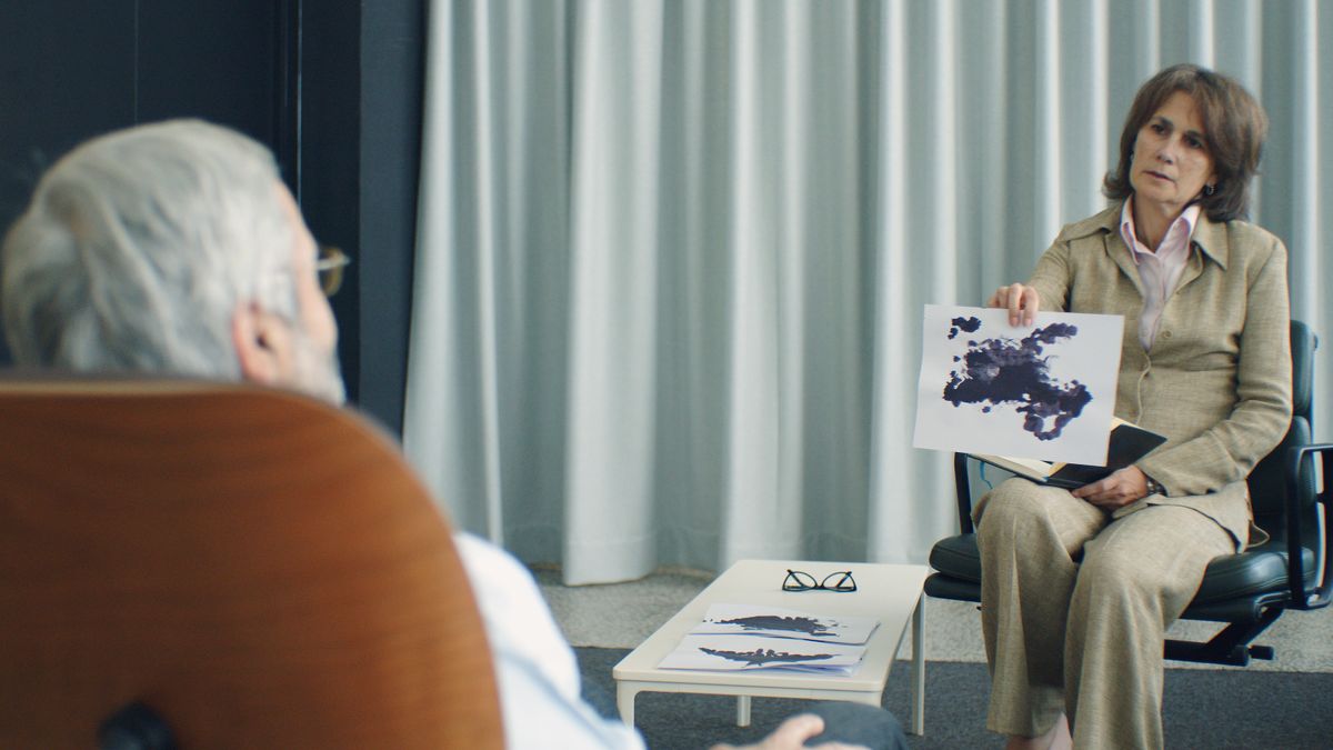 A psychiatrist meeting with a patient during a mental health evaluation, the kind of first visit a psychiatry practice needs to fill and keep
