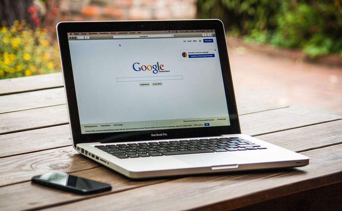 A laptop showing a website on a table, representing patients trying to use a medical practice website