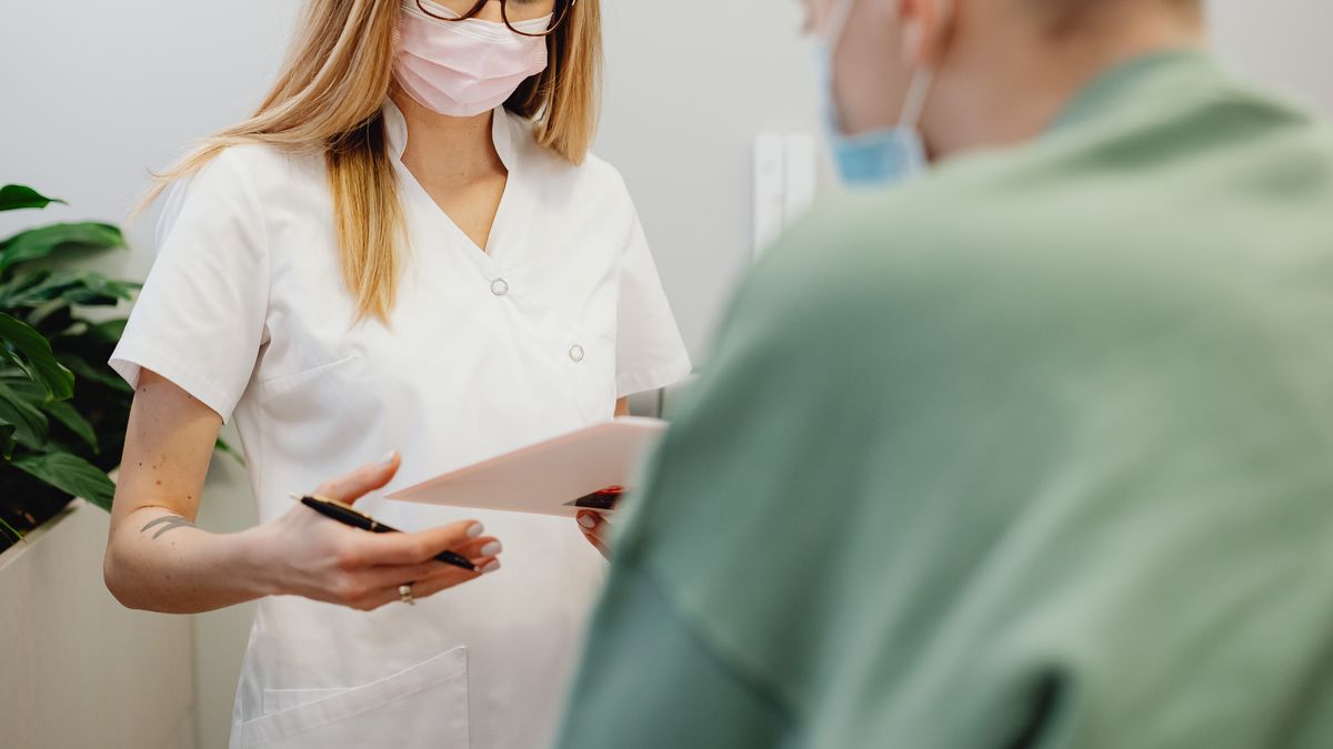 A friendly front desk at a medical practice where an AI receptionist answers patients around the clock