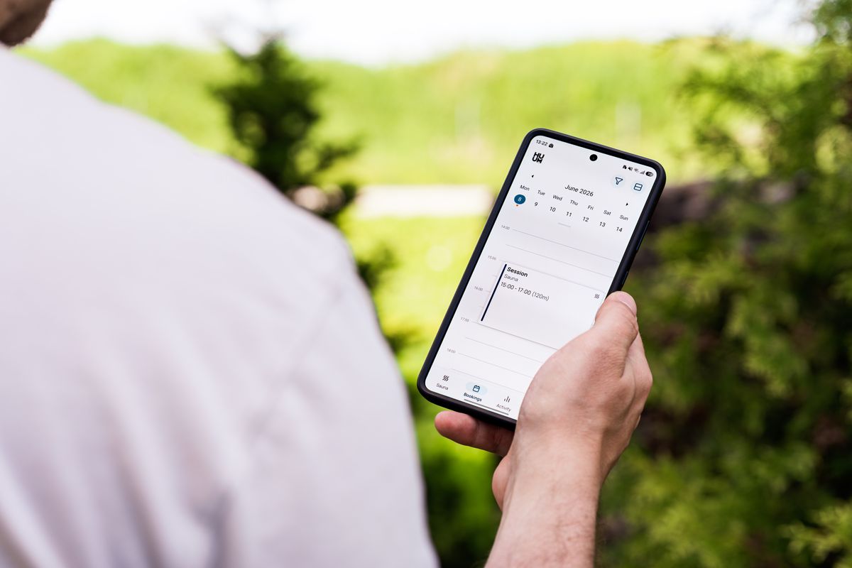 A patient booking an appointment on a phone from a calendar screen, the kind of instant scheduling Reserve with Google puts on a medical practice Google listing