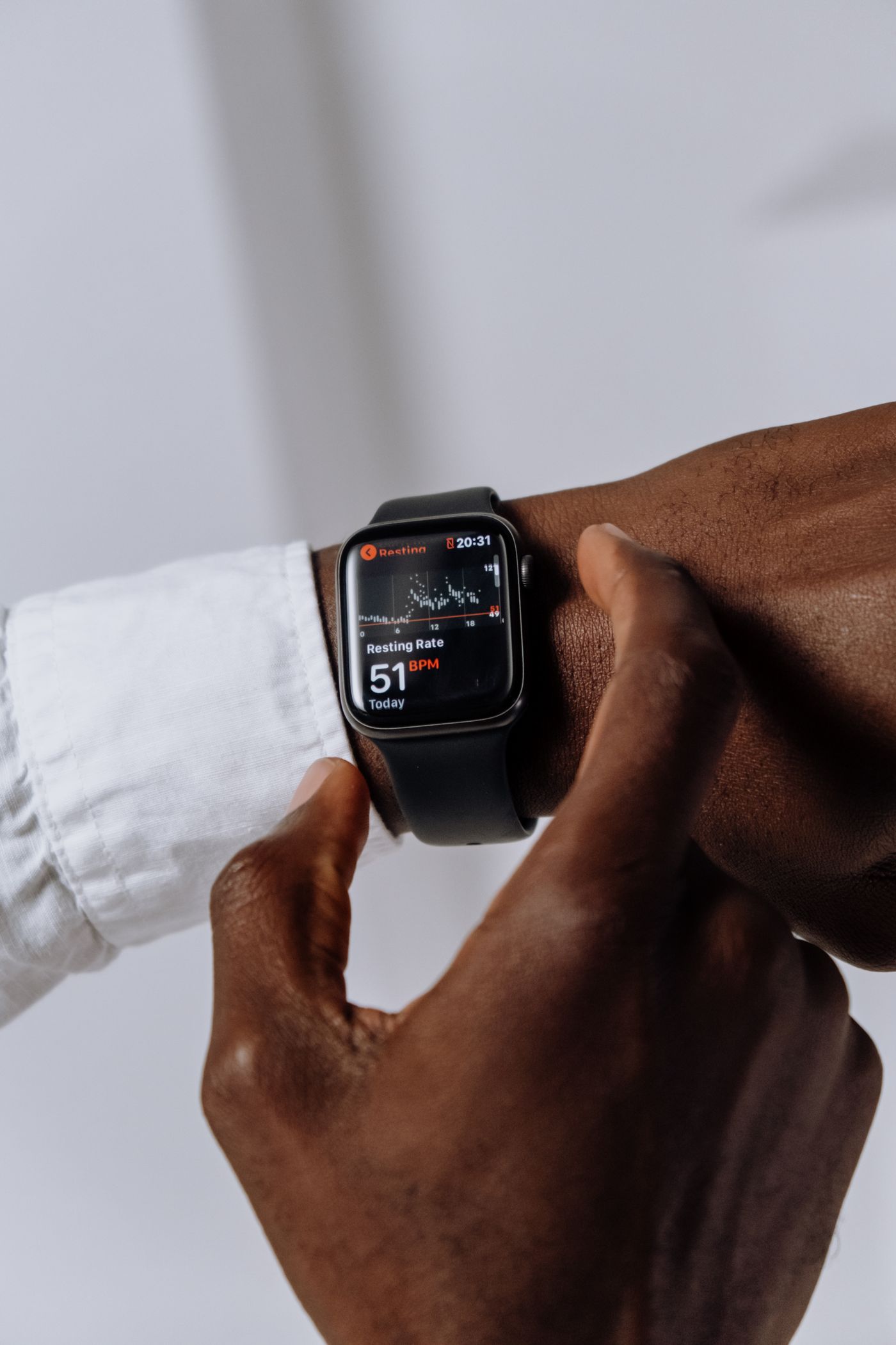 A patient checking a full day of resting heart rate data on a smartwatch, the self tracking patient a modern medical practice needs to be ready for