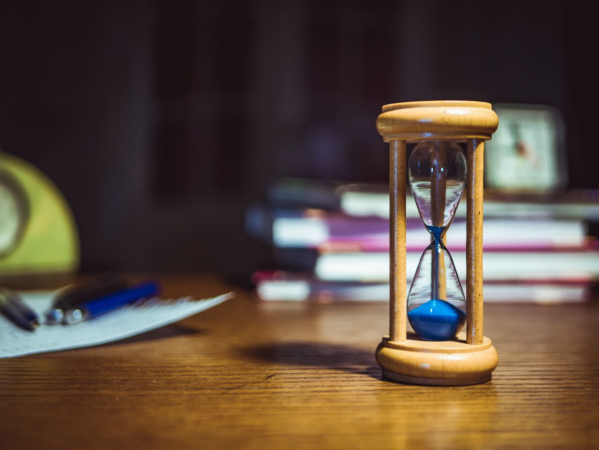 A full appointment book on a desk, the kind of packed schedule that makes practice owners want to pause their marketing
