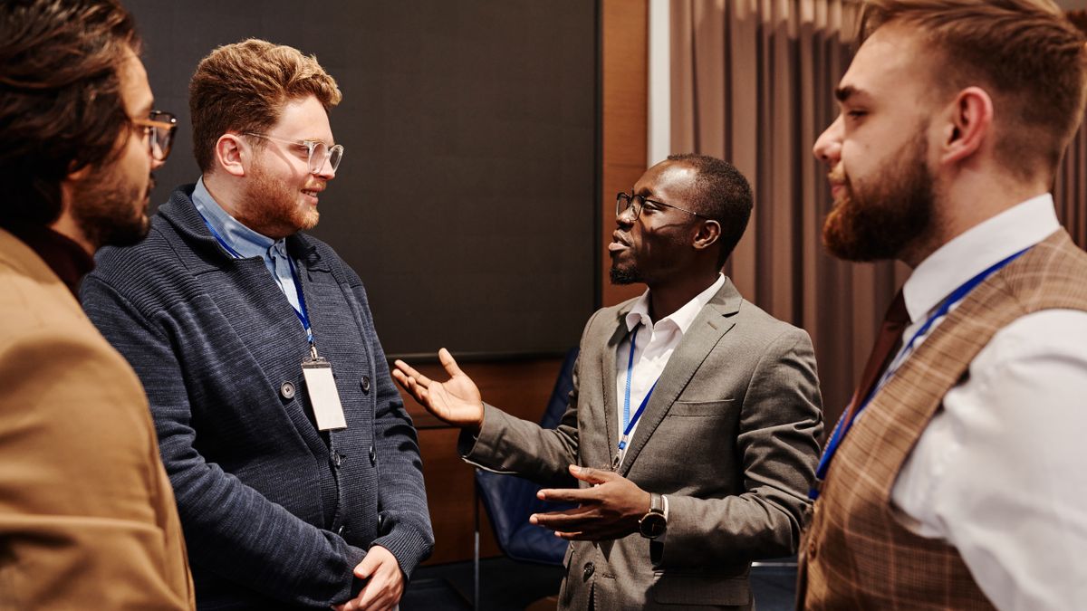 Healthcare professionals talking and building relationships, the kind of connections a medical practice builds on LinkedIn