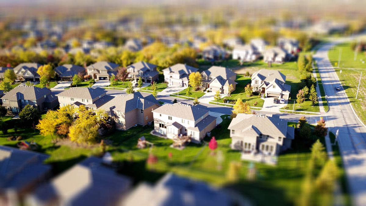 Aerial view of a suburban neighborhood, the kind of community where patients ask each other for a good doctor on Nextdoor