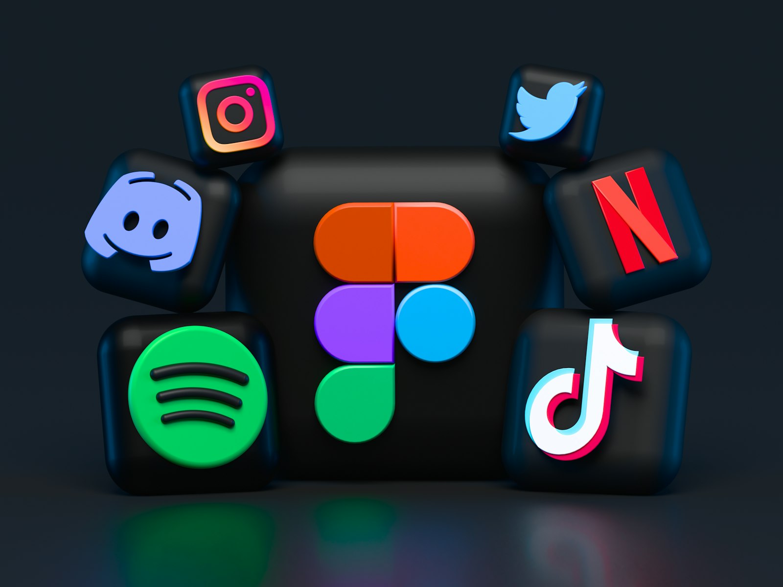 TikTok, Instagram and Spotify app icons, the platforms where trending audio decides how far a medical practice video travels