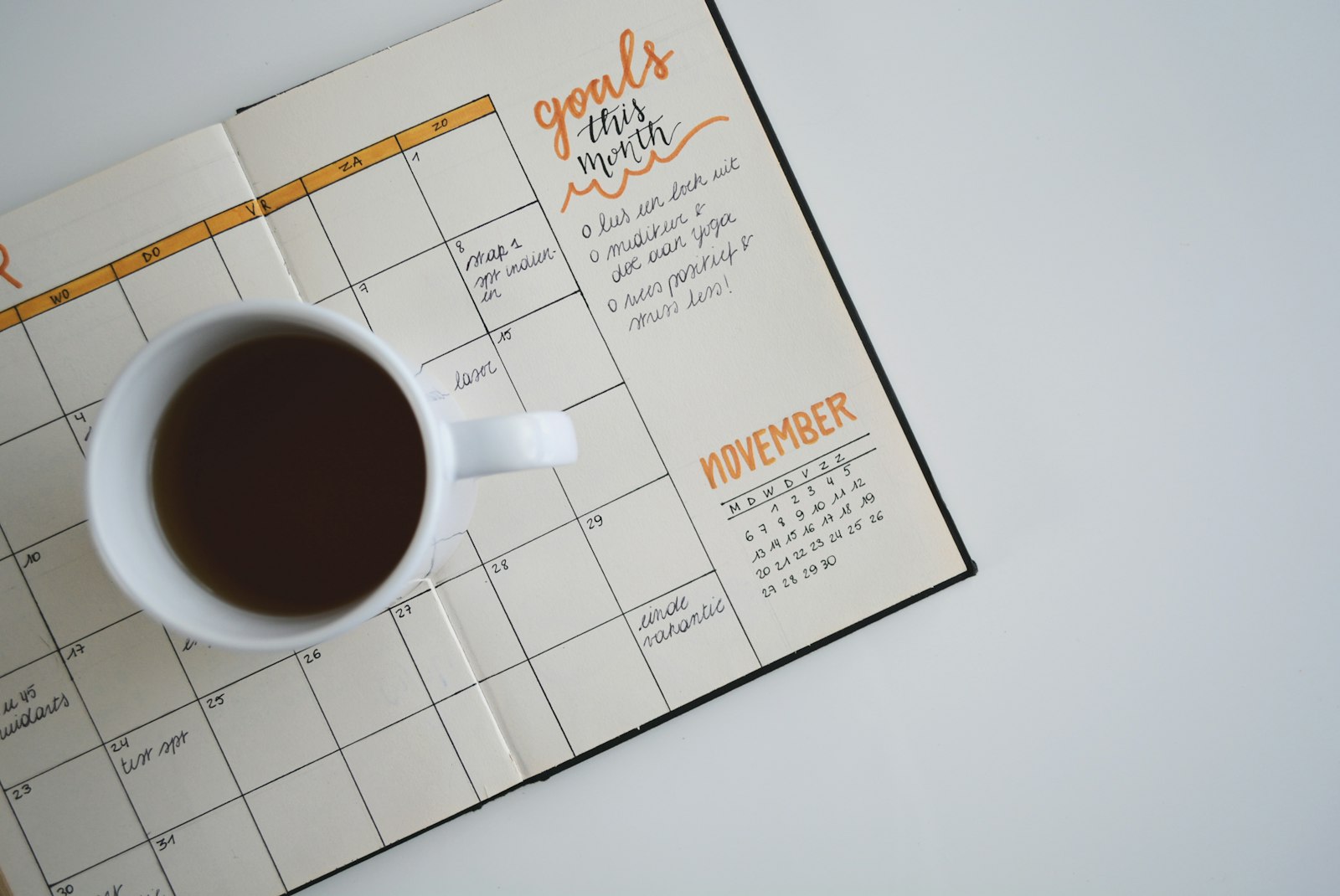 An open calendar and planner, the full schedule that tempts a medical practice to pause its Google Ads