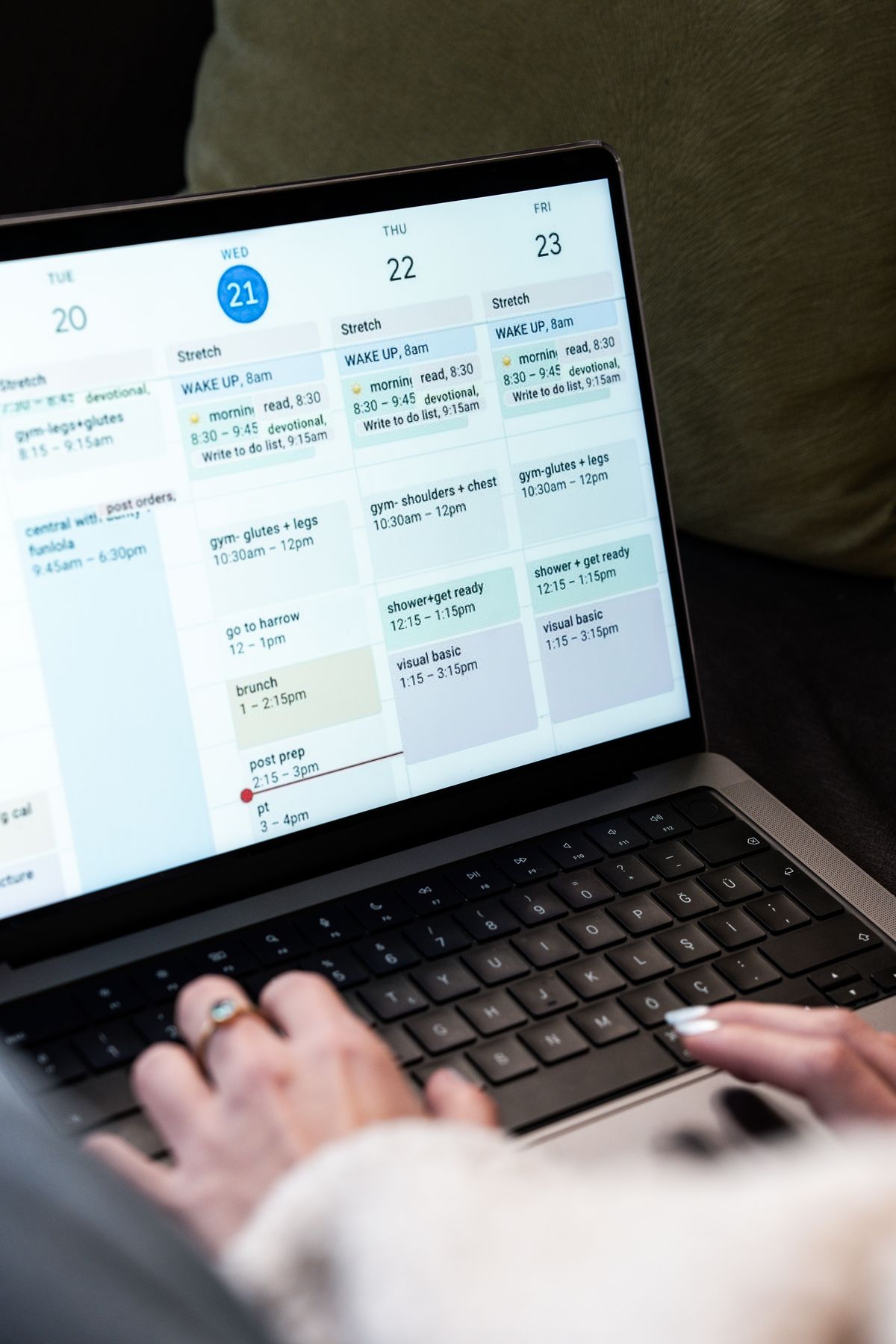 Patient viewing open appointment times on a laptop calendar to book online