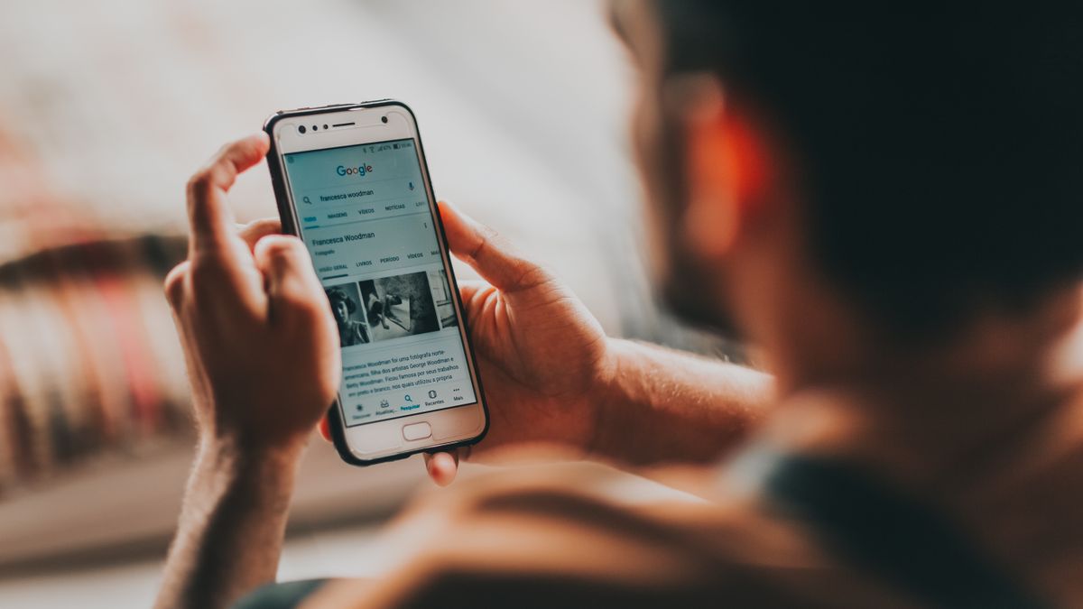 Patient scanning a list of Google search results on a phone before choosing a medical practice