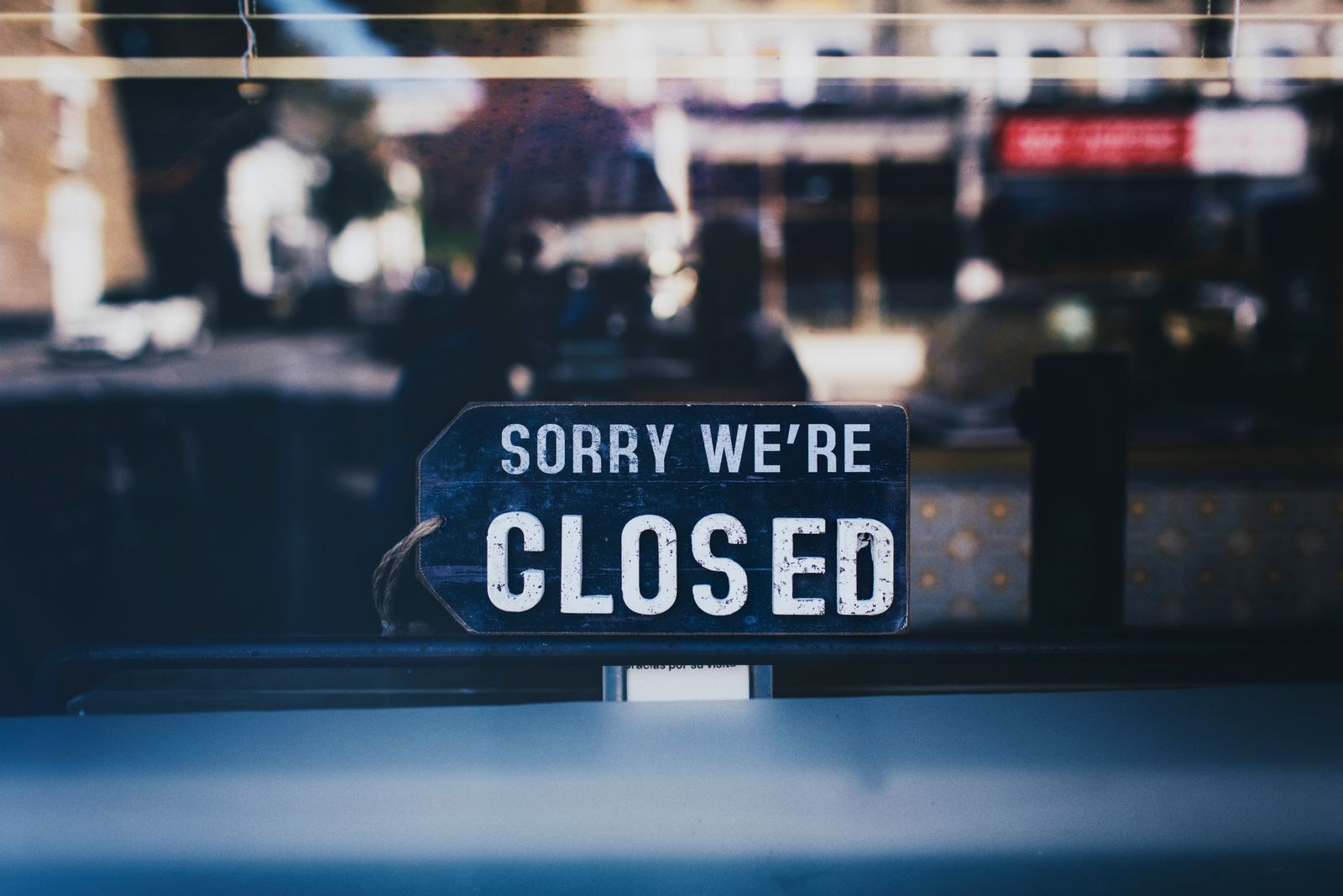A sorry we are closed sign on a glass door, the view a patient gets when your online hours or address are wrong